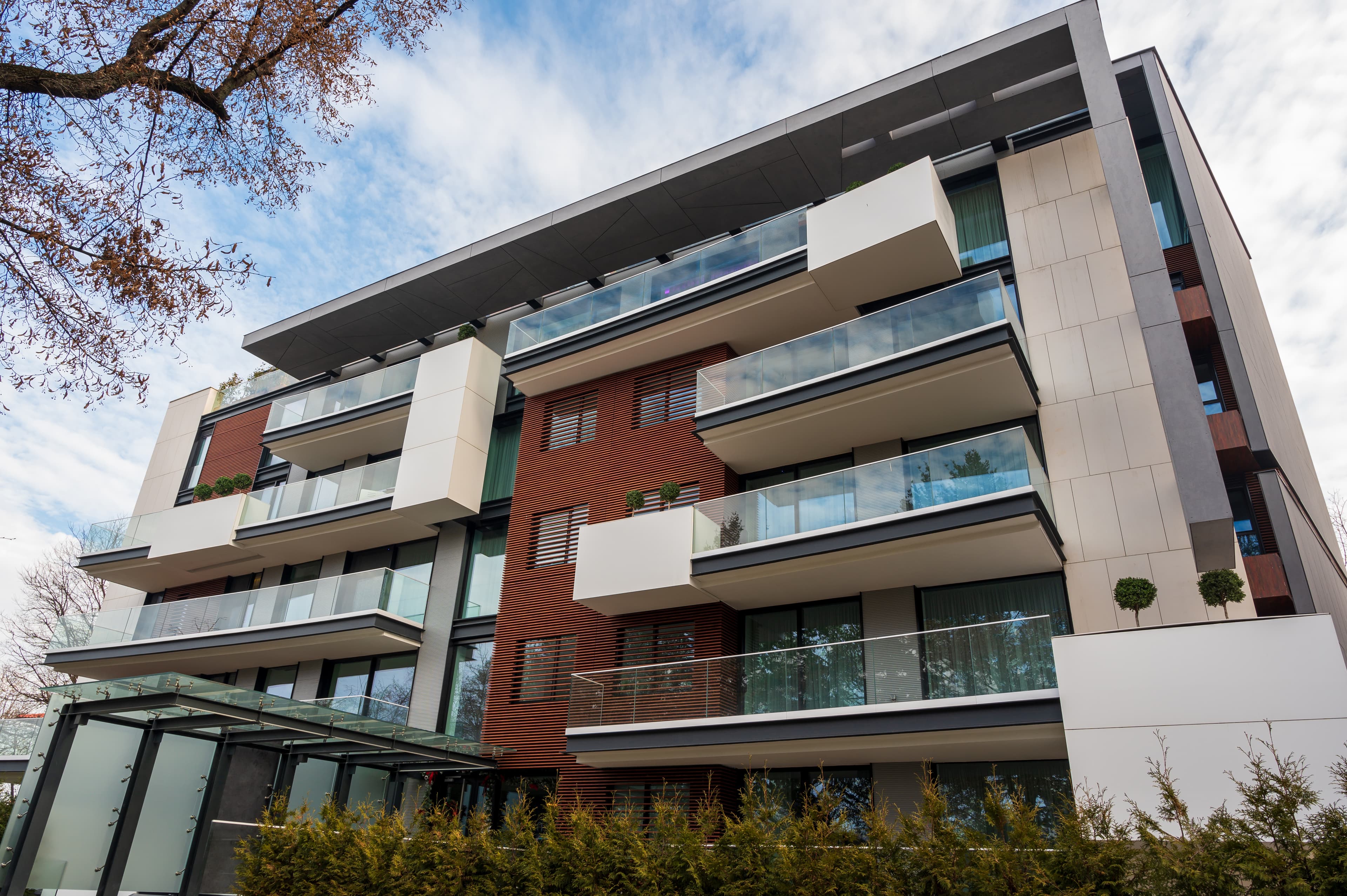 Modern urban townhouses along a residential street